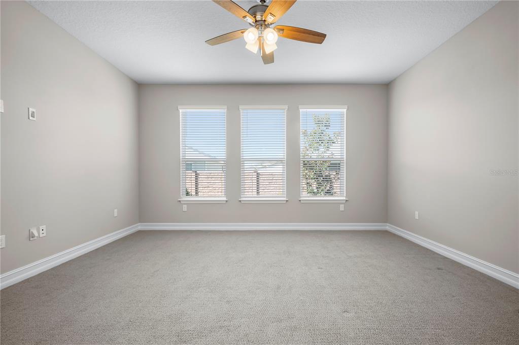 4474 Northwest 53rd Avenue Road Ocala, FL 34480 - Photo 26 of 78 wooden floor in an empty room with a window