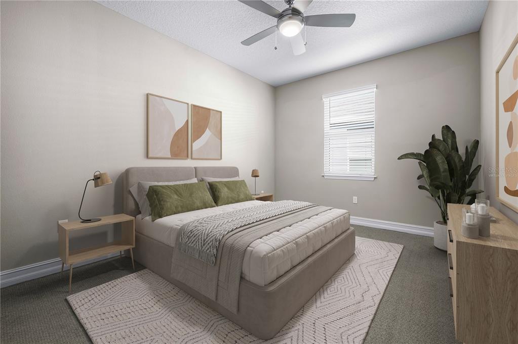 4474 Northwest 53rd Avenue Road Ocala, FL 34480 - Photo 29 of 78 a bedroom with a large bed and a window