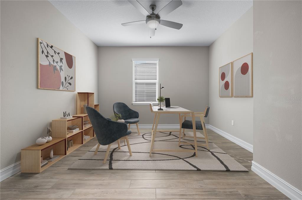 4474 Northwest 53rd Avenue Road Ocala, FL 34480 - Photo 40 of 78 a living room with furniture and a painting on the wall