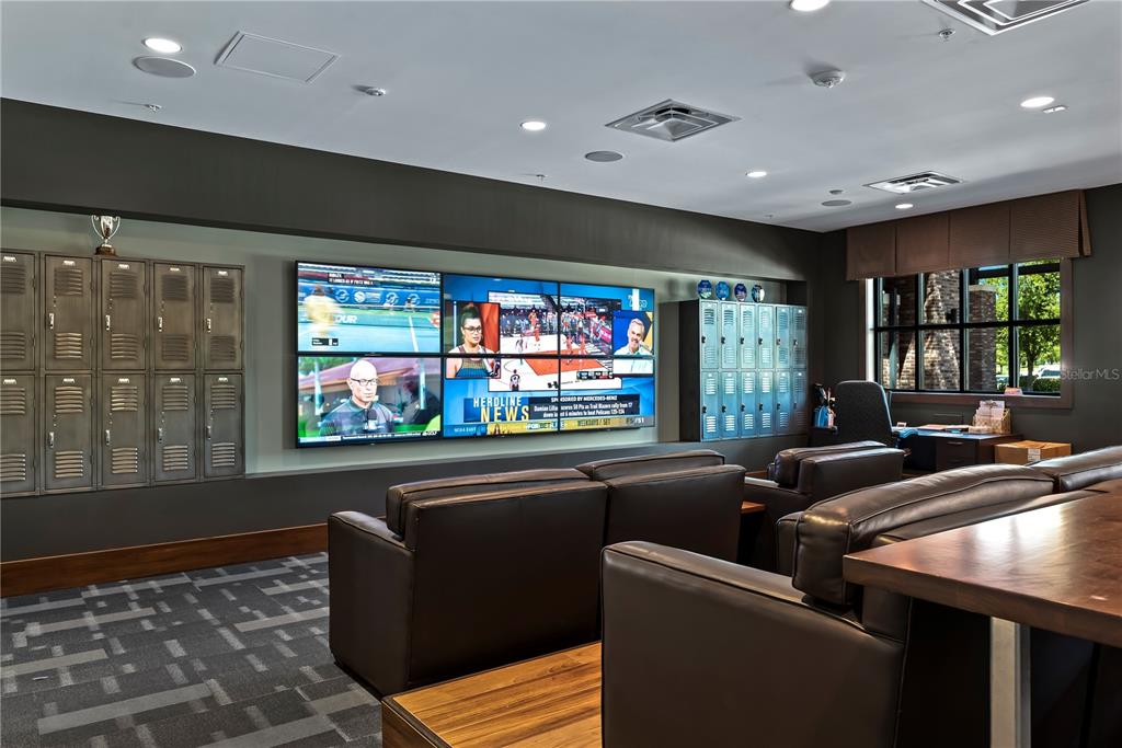 4474 Northwest 53rd Avenue Road Ocala, FL 34480 - Photo 62 of 78 a living room with furniture and a flat screen tv