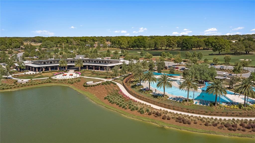 4474 Northwest 53rd Avenue Road Ocala, FL 34480 - Photo 69 of 78 an aerial view of residential houses with outdoor space and lake view