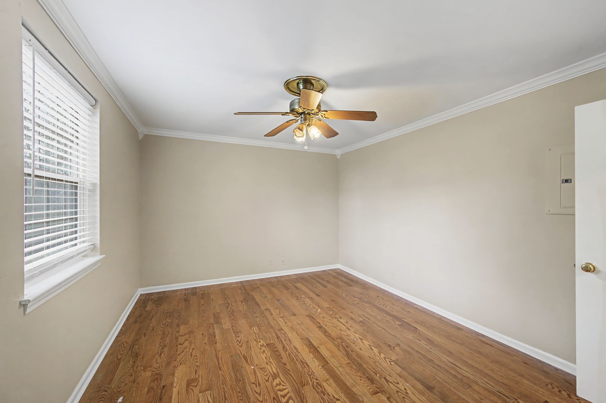 1011 Murfreesboro Road, Unit L10 Franklin, TN 37064 - Photo 25 of 47 a view of a room with wooden floor and window