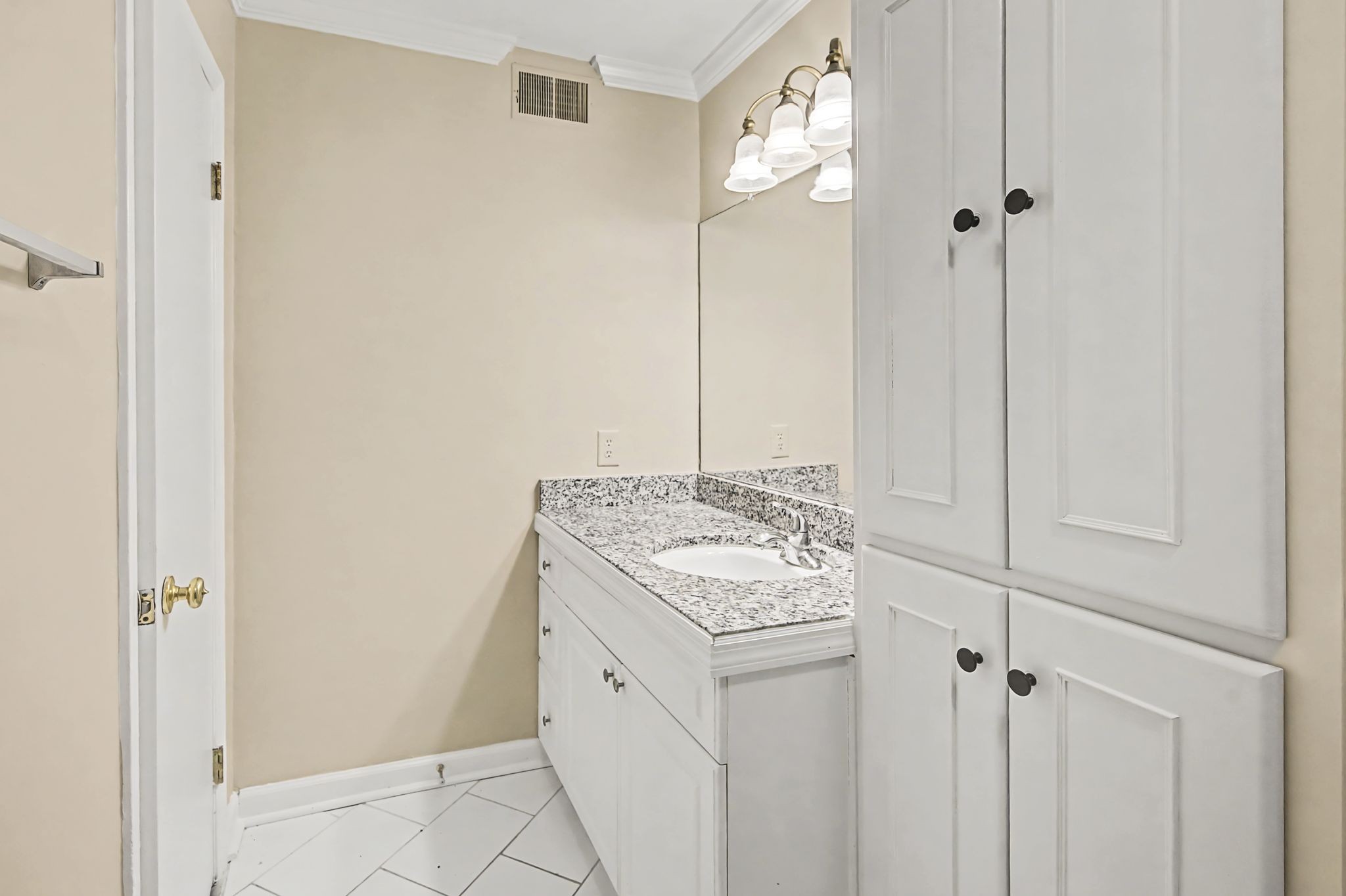 1011 Murfreesboro Road, Unit L10 Franklin, TN 37064 - Photo 31 of 47 a bathroom with a sink vanity and tub