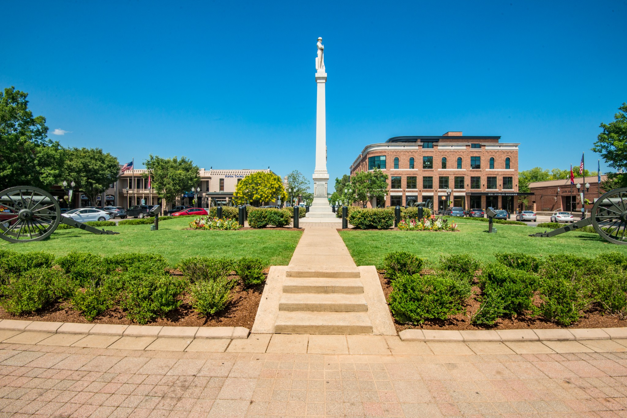 1011 Murfreesboro Road, Unit L10 Franklin, TN 37064 - Photo 39 of 47 a front view of a house with a yard
