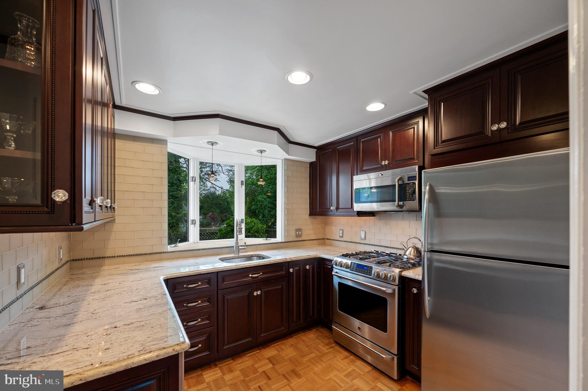 243 Walnut Road Strafford, PA 19087 - Photo 14 of 37 Updated Kitchen with Stainless Steel Appliances
