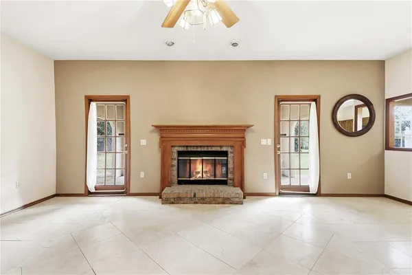 a large kitchen with cabinets and stainless steel appliances