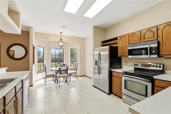 a kitchen with a sink and a stove