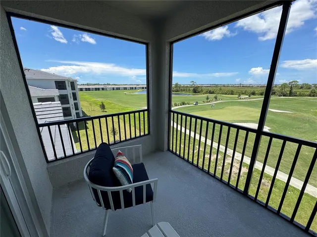 a view of a porch with furniture