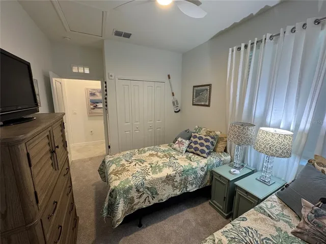 a bathroom with a sink a toilet a shower and a mirror