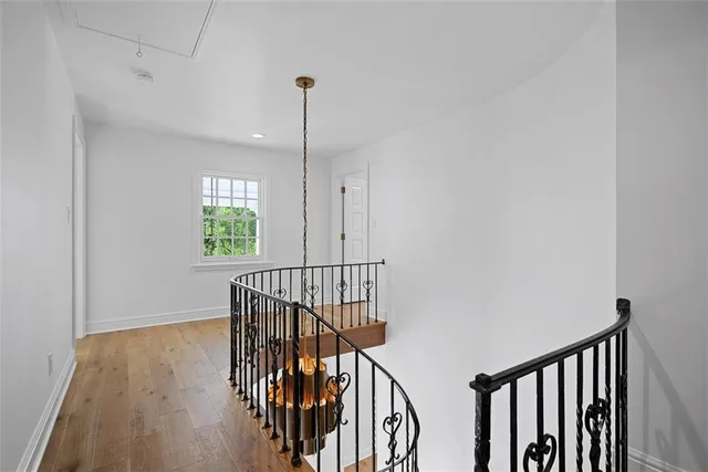 a bathroom with a granite countertop sink a toilet and a bathtub