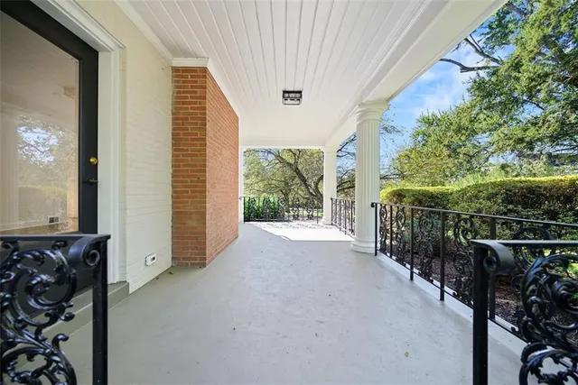 a view of a porch with furniture