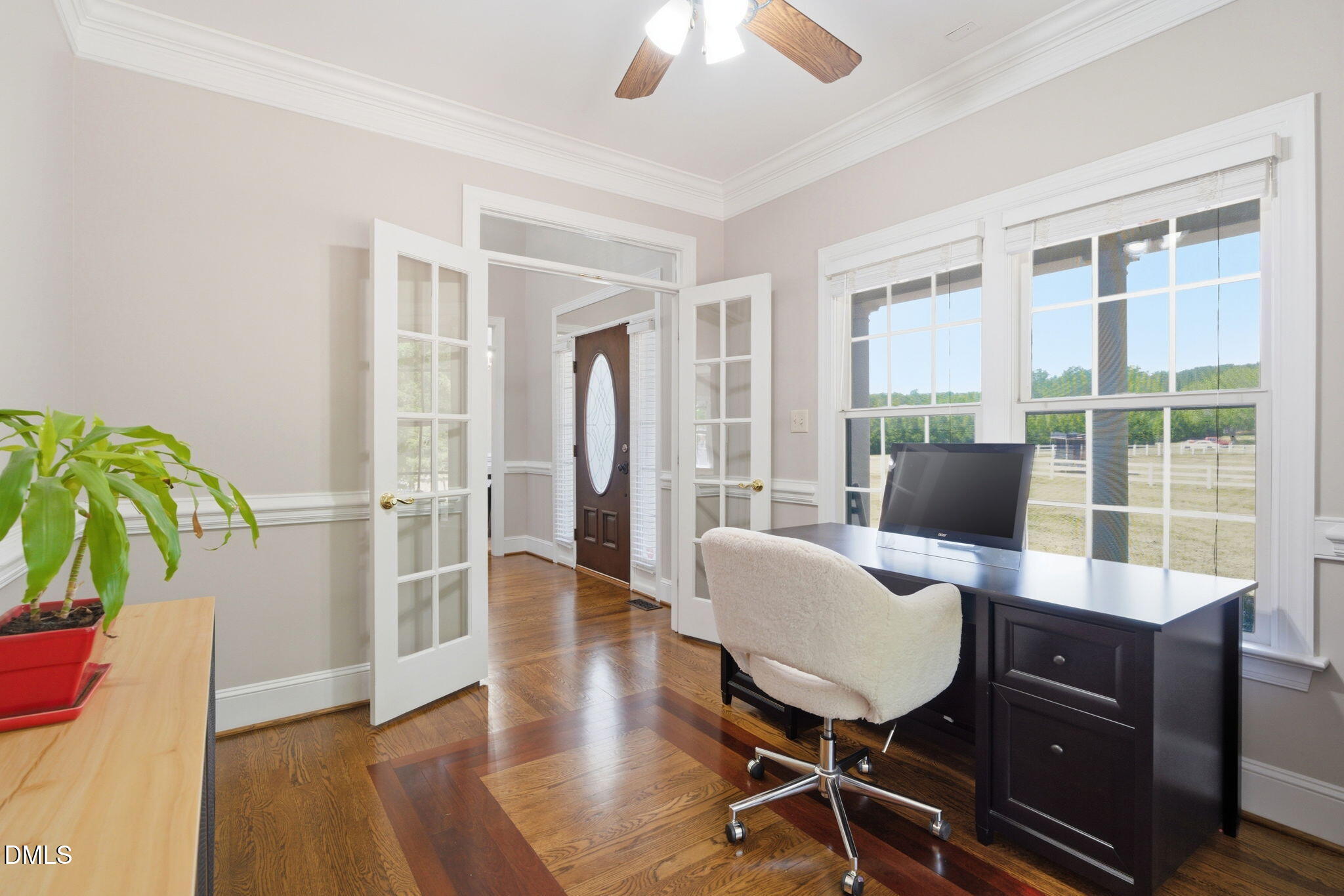 5416 Pulley Town Road Zebulon, NC 27597 - Photo 21 of 74 a view of a livingroom with furniture and a potted plant
