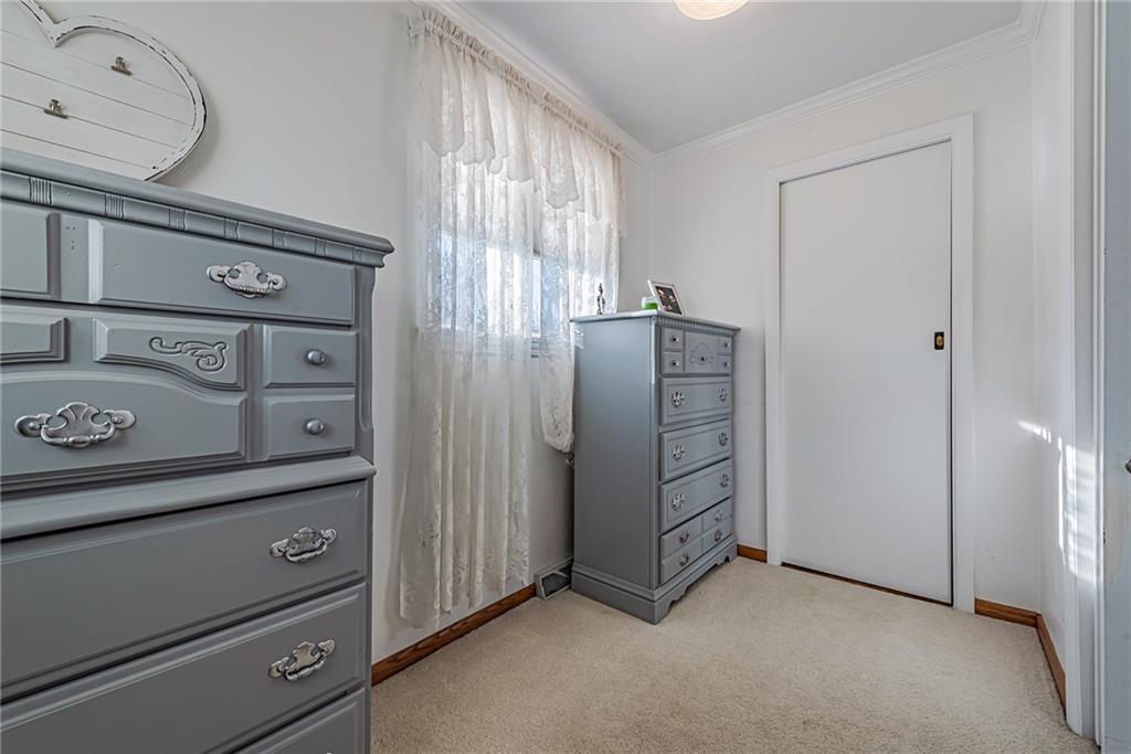 210 Grant Street North Huntingdon, PA 15642 - Photo 14 of 18 a view of a kitchen with cabinets