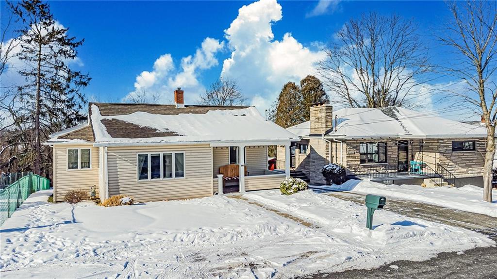 210 Grant Street North Huntingdon, PA 15642 - Photo 16 of 18 a dinning table in a backyard of a house