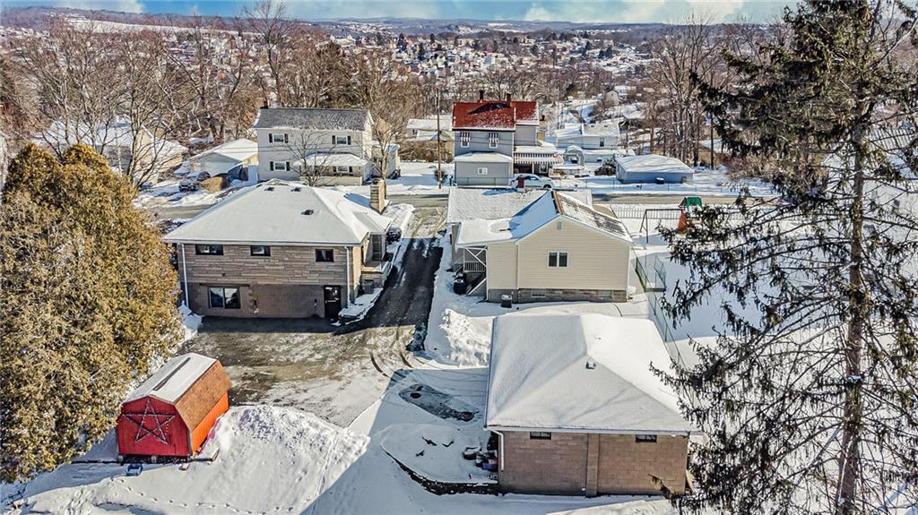 210 Grant Street North Huntingdon, PA 15642 - Photo 17 of 18 an aerial view of a house with a yard