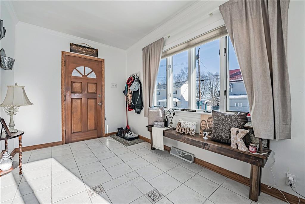 210 Grant Street North Huntingdon, PA 15642 - Photo 3 of 18 a living room with furniture and a large window