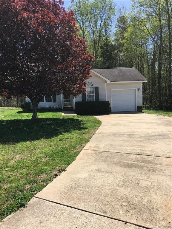 4306 Lothar Ridge Lane Charlotte, NC 28216 - Photo 2 of 22 a front view of house with yard and green space