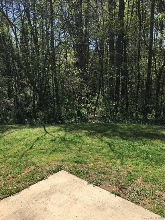 4306 Lothar Ridge Lane Charlotte, NC 28216 - Photo 22 of 22 a view of backyard with green space