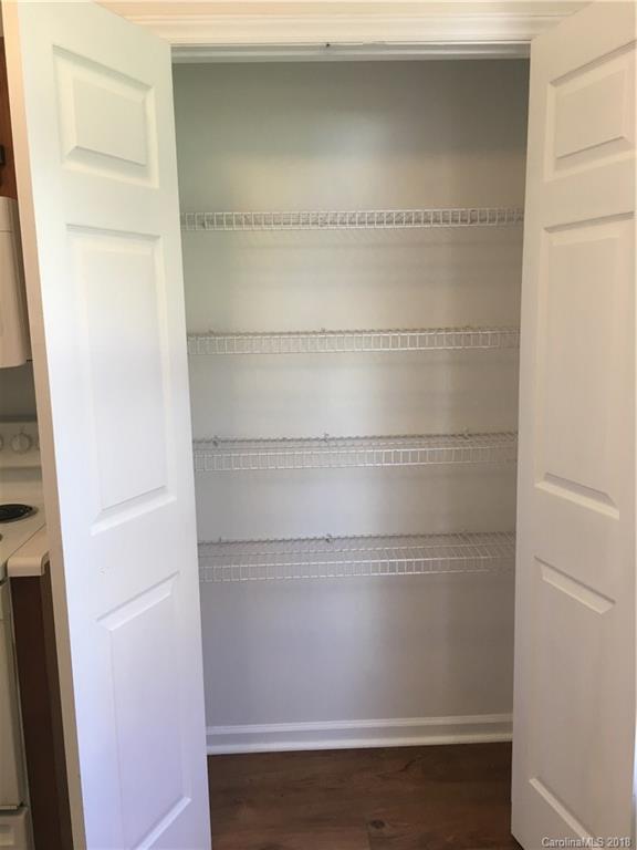 4306 Lothar Ridge Lane Charlotte, NC 28216 - Photo 5 of 22 a close view of cupboard