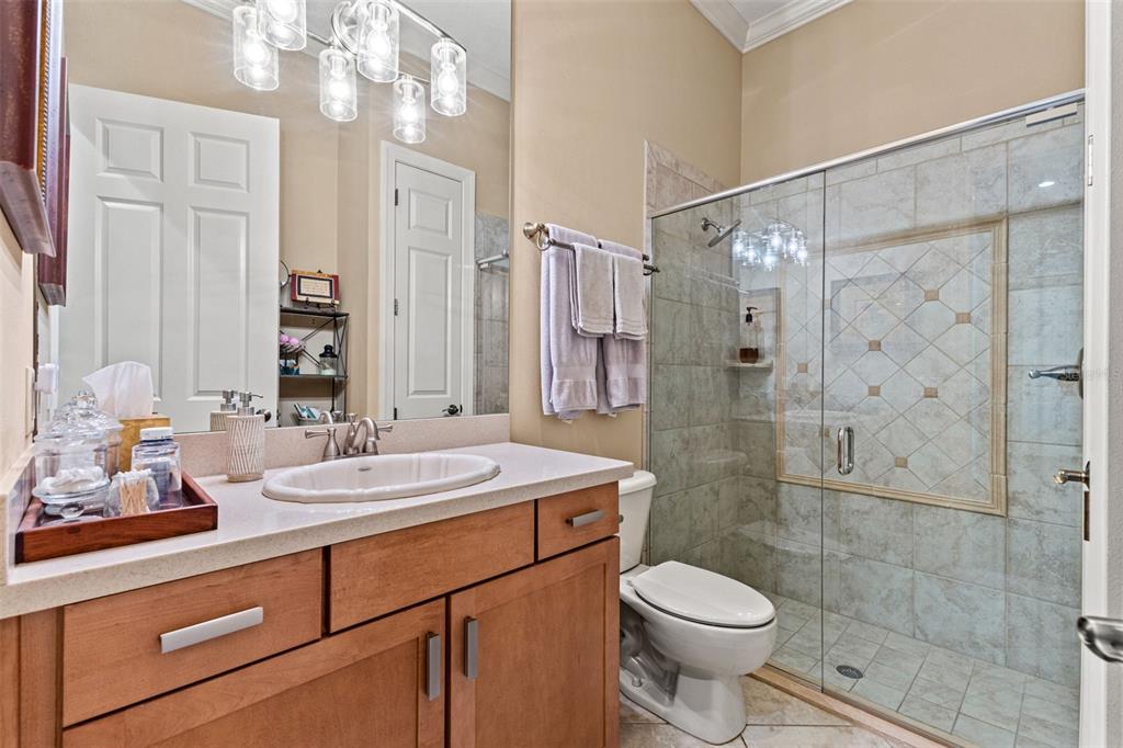 4978 Southern Valley Loop Brooksville, FL 34601 - Photo 48 of 78 a bathroom with a sink toilet and shower