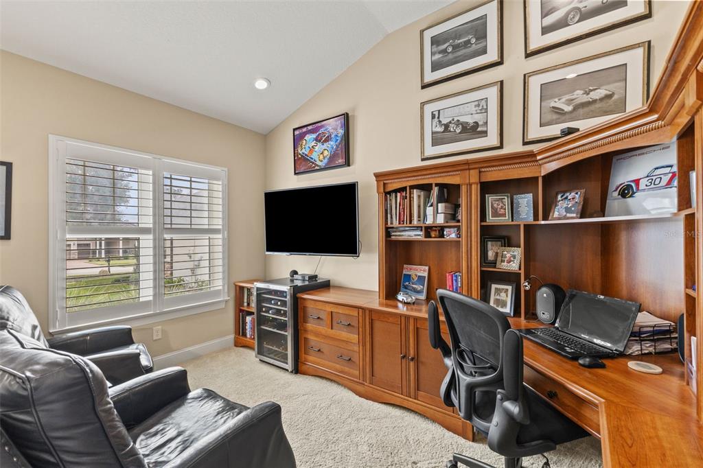 4978 Southern Valley Loop Brooksville, FL 34601 - Photo 50 of 78 a view of a livingroom with workspace and a window