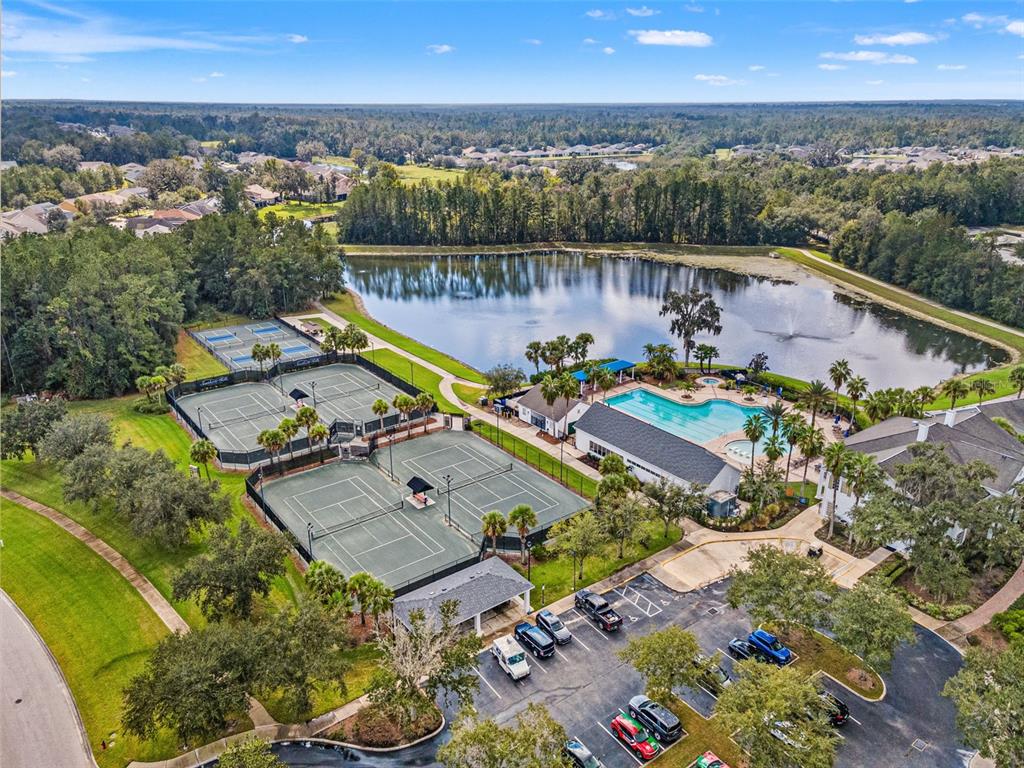 4978 Southern Valley Loop Brooksville, FL 34601 - Photo 59 of 78 an aerial view of a house with a lake view