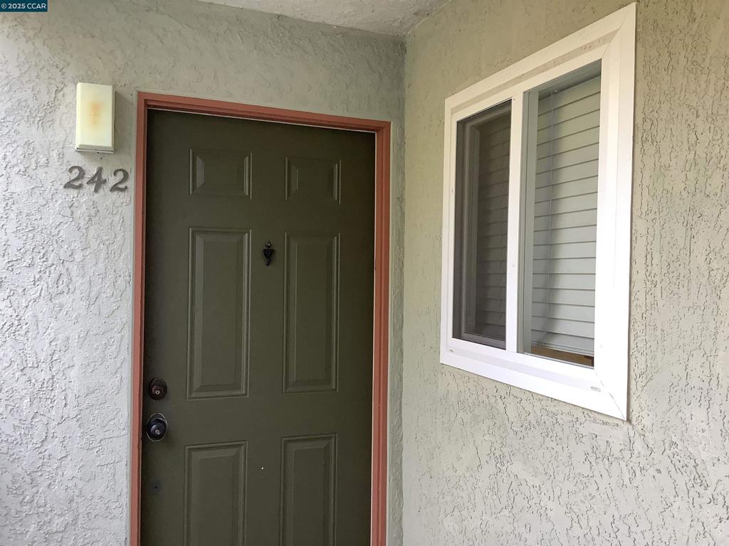 1505 Kirker Pass Road Concord, CA 94521 - Photo 2 of 19 a view of a wooden door
