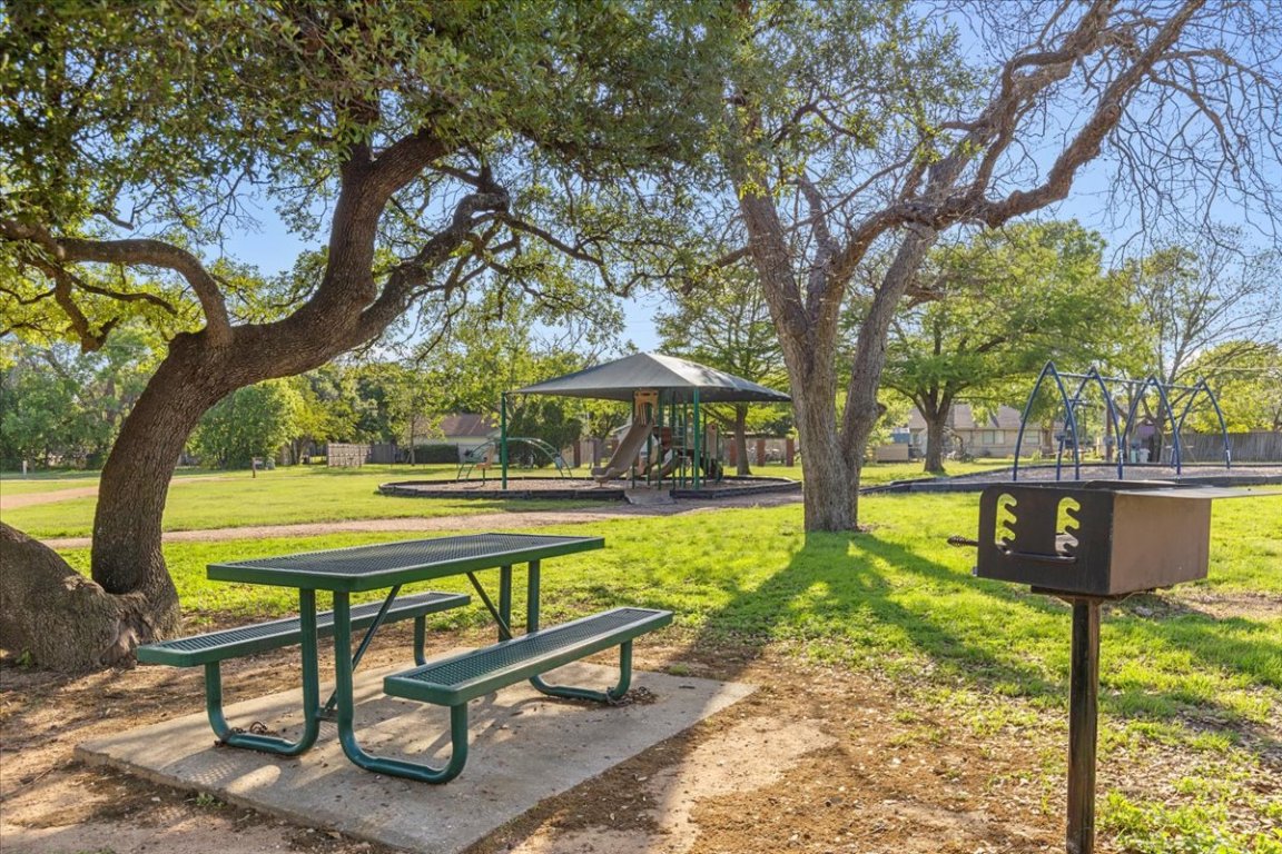 10616 Mellow Meadow Drive, Unit 21C Austin, TX 78750 - Photo 29 of 39 a view of a park with large trees