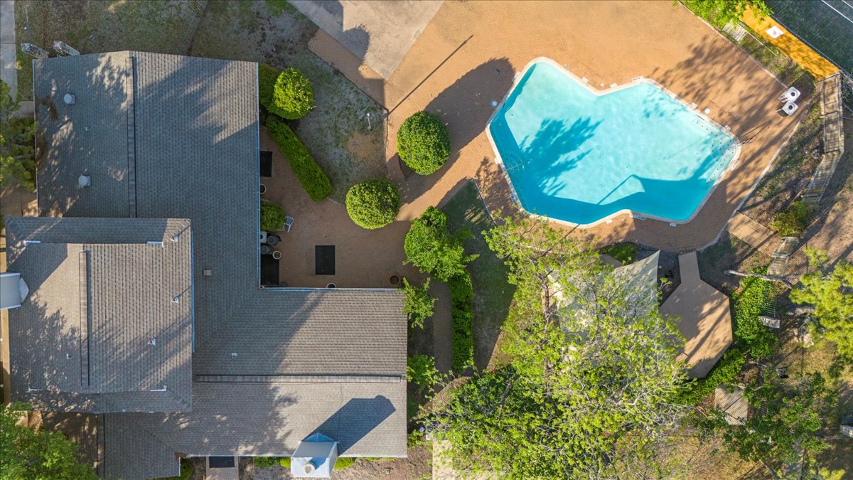 10616 Mellow Meadow Drive, Unit 21C Austin, TX 78750 - Photo 33 of 39 an aerial view of a house with swimming pool