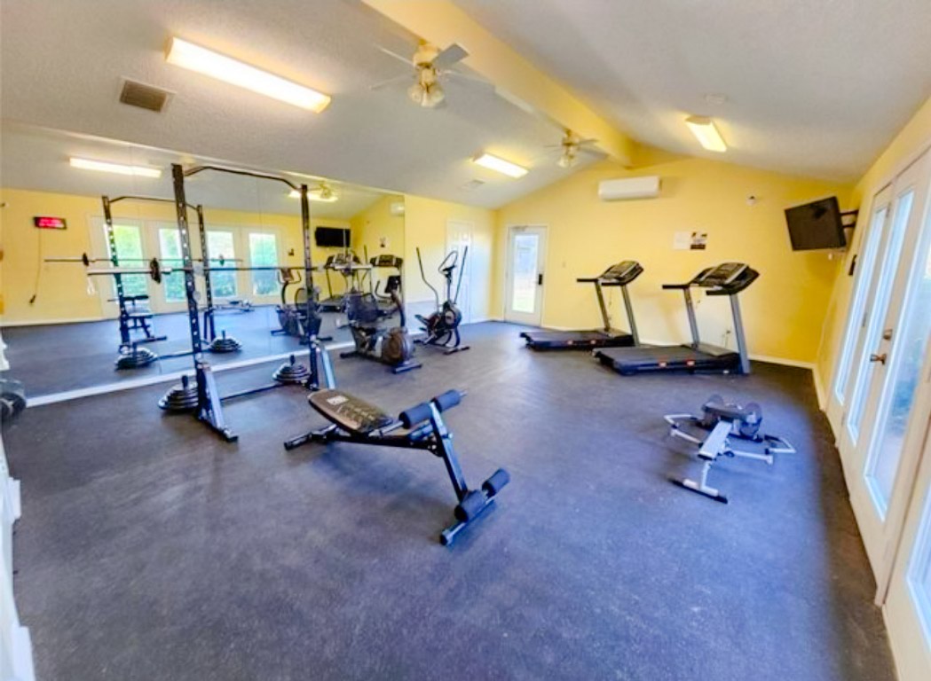 10616 Mellow Meadow Drive, Unit 21C Austin, TX 78750 - Photo 35 of 39 a view of a room with gym equipment