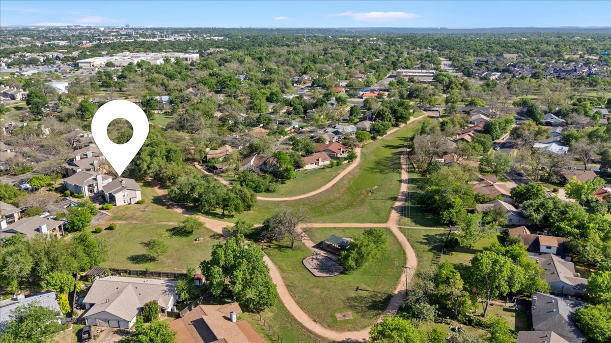 10616 Mellow Meadow Drive, Unit 21C Austin, TX 78750 - Photo 6 of 39 an aerial view of a house with a swimming pool