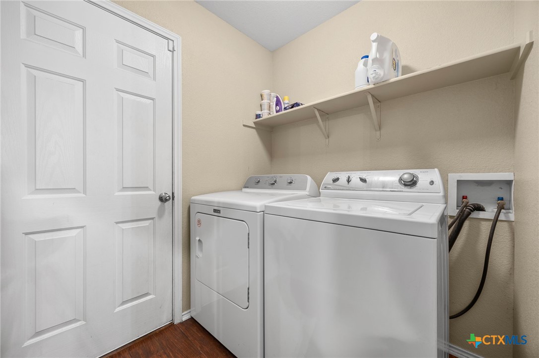 910 Neuberry Cliffe Temple, TX 76502 - Photo 22 of 32 a utility room with dryer and washer