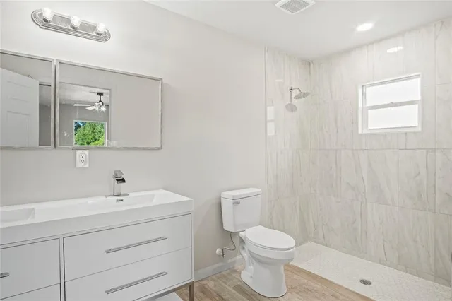 a view of a bathroom with a shower curtain