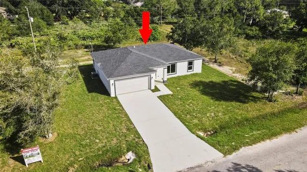 a view of a backyard with a garden