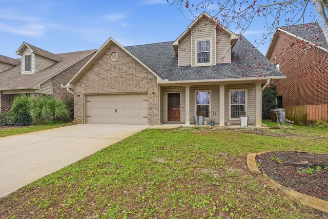 a stove top oven sitting inside of a kitchen
