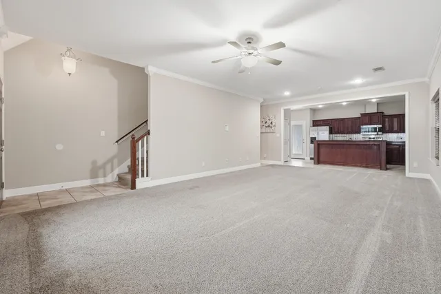 a kitchen with stainless steel appliances granite countertop a stove and a sink