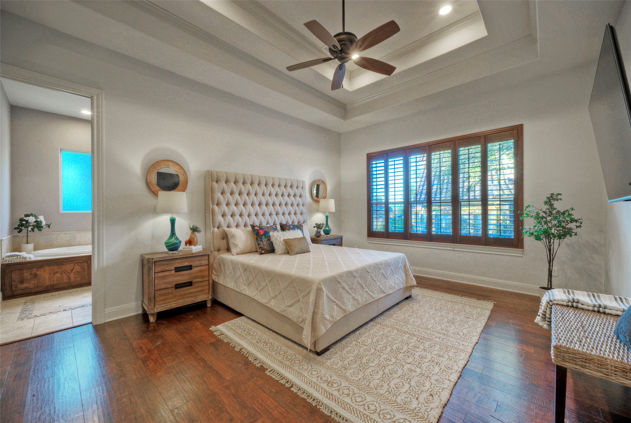 7 Parkside Road The Hills, TX 78738 - Photo 14 of 36 Bedroom with dark wood-type flooring, ornamental molding, a ceiling fan, and ensuite bathroom