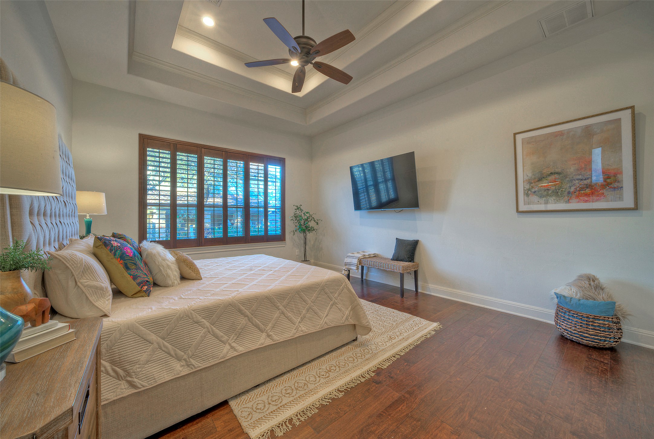 7 Parkside Road The Hills, TX 78738 - Photo 16 of 36 Bedroom with crown molding, wood finished floors, and a ceiling fan