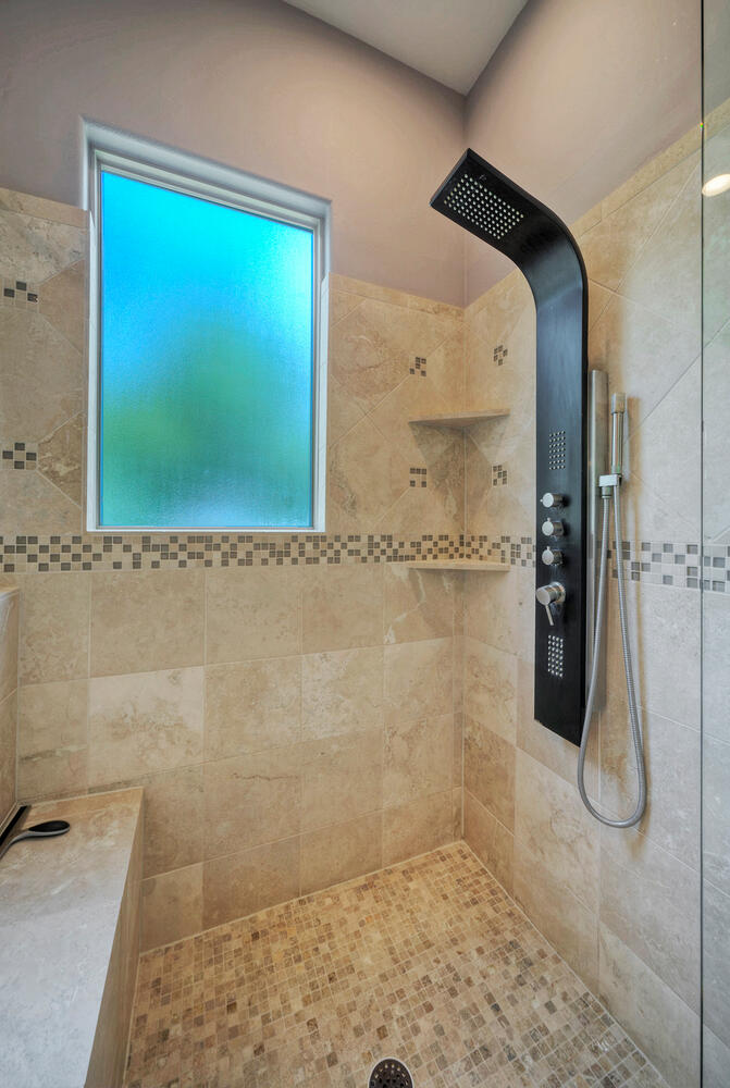 7 Parkside Road The Hills, TX 78738 - Photo 19 of 36 Full bath with a tile shower