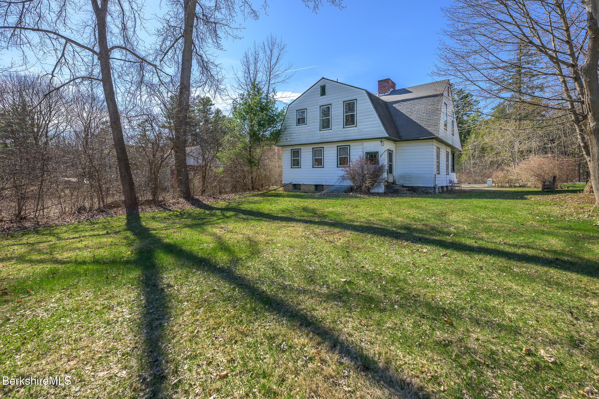 6 East Street Stockbridge, MA 01262 - Photo 23 of 23 a view of a house with a big yard and large trees
