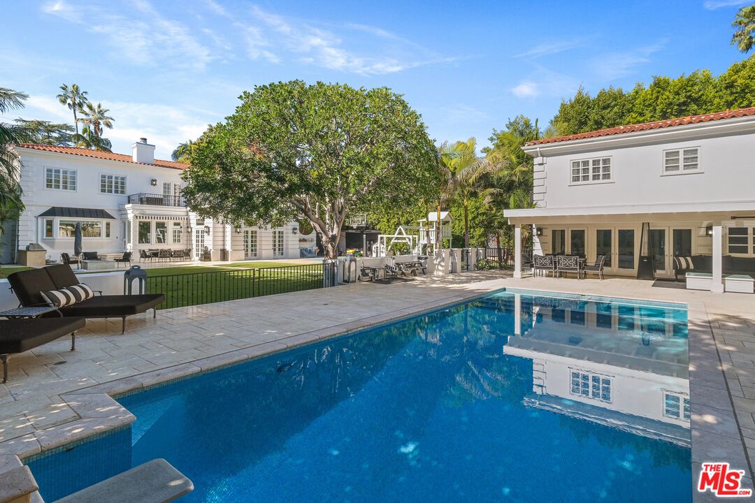 708 North Hillcrest Road Beverly Hills, CA 90210 - Photo 3 of 11 a view of house with yard
