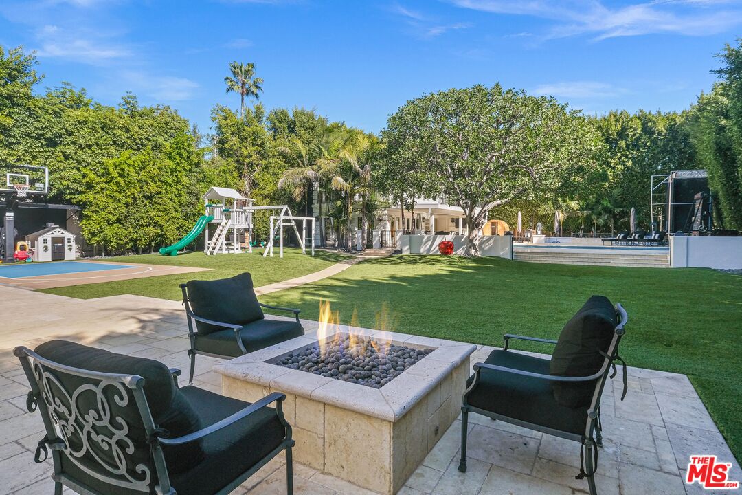 708 North Hillcrest Road Beverly Hills, CA 90210 - Photo 4 of 11 a view of outdoor space yard swimming pool and patio