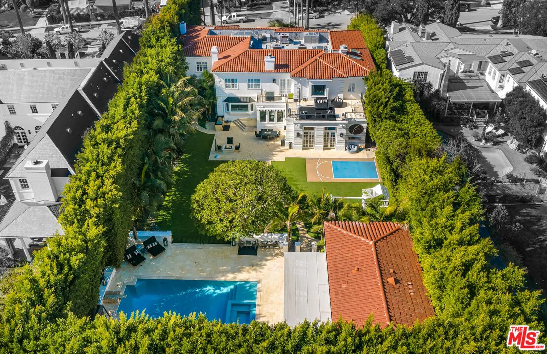 708 North Hillcrest Road Beverly Hills, CA 90210 - Photo 10 of 11 an aerial view of multiple houses with yard