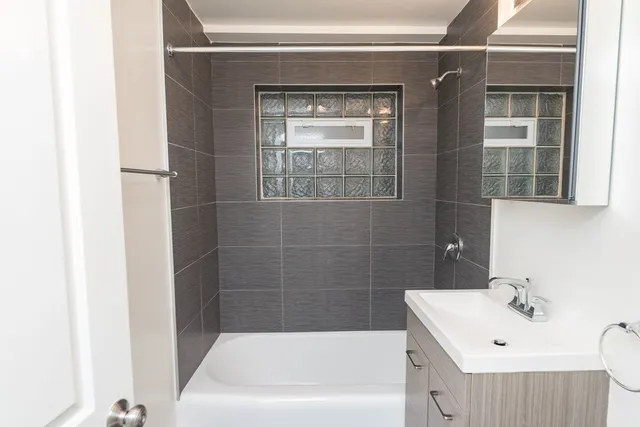 a bathroom with a sink and a bathtub