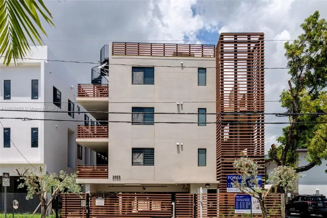 a view of a building with glass windows