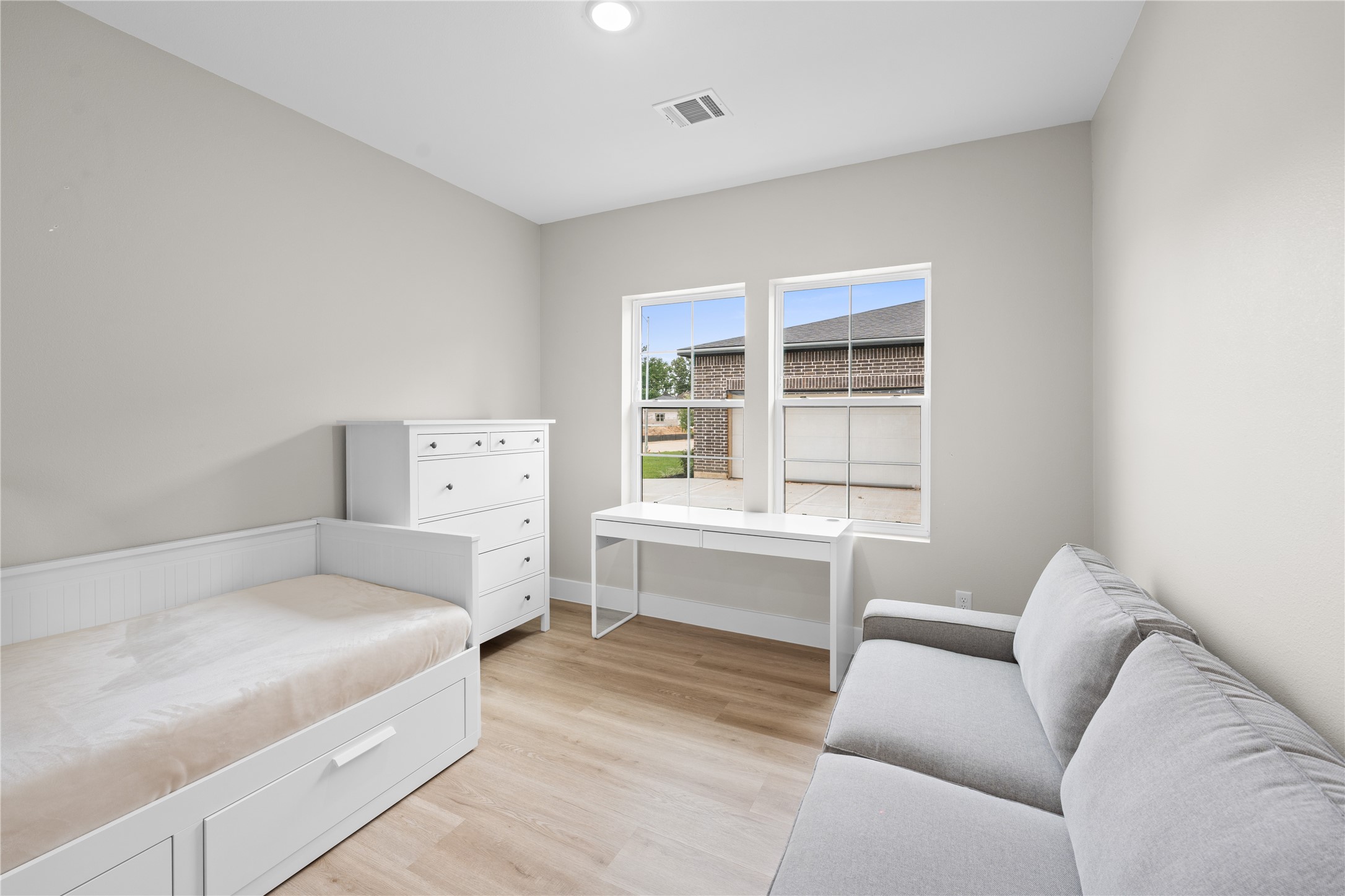 2606 Piemonte Avenue Cir Spring Spring, TX 77388 - Photo 11 of 17 a living room with furniture and a window