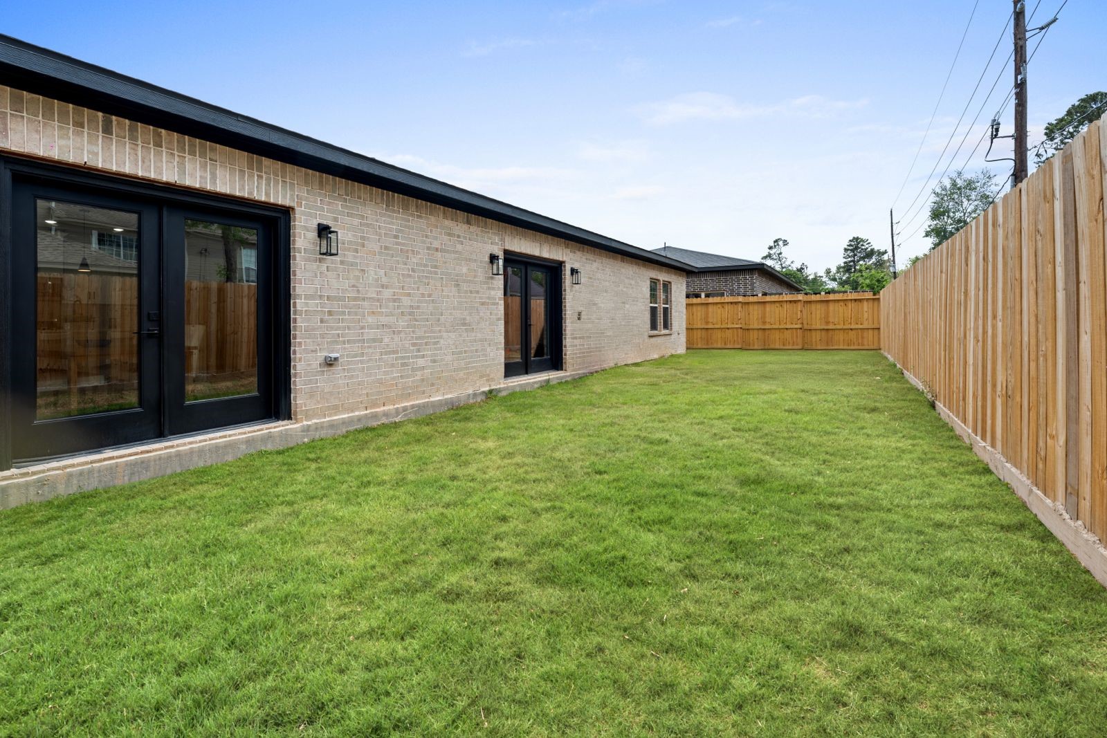 2606 Piemonte Avenue Cir Spring Spring, TX 77388 - Photo 17 of 17 a backyard of a house with lots of green space