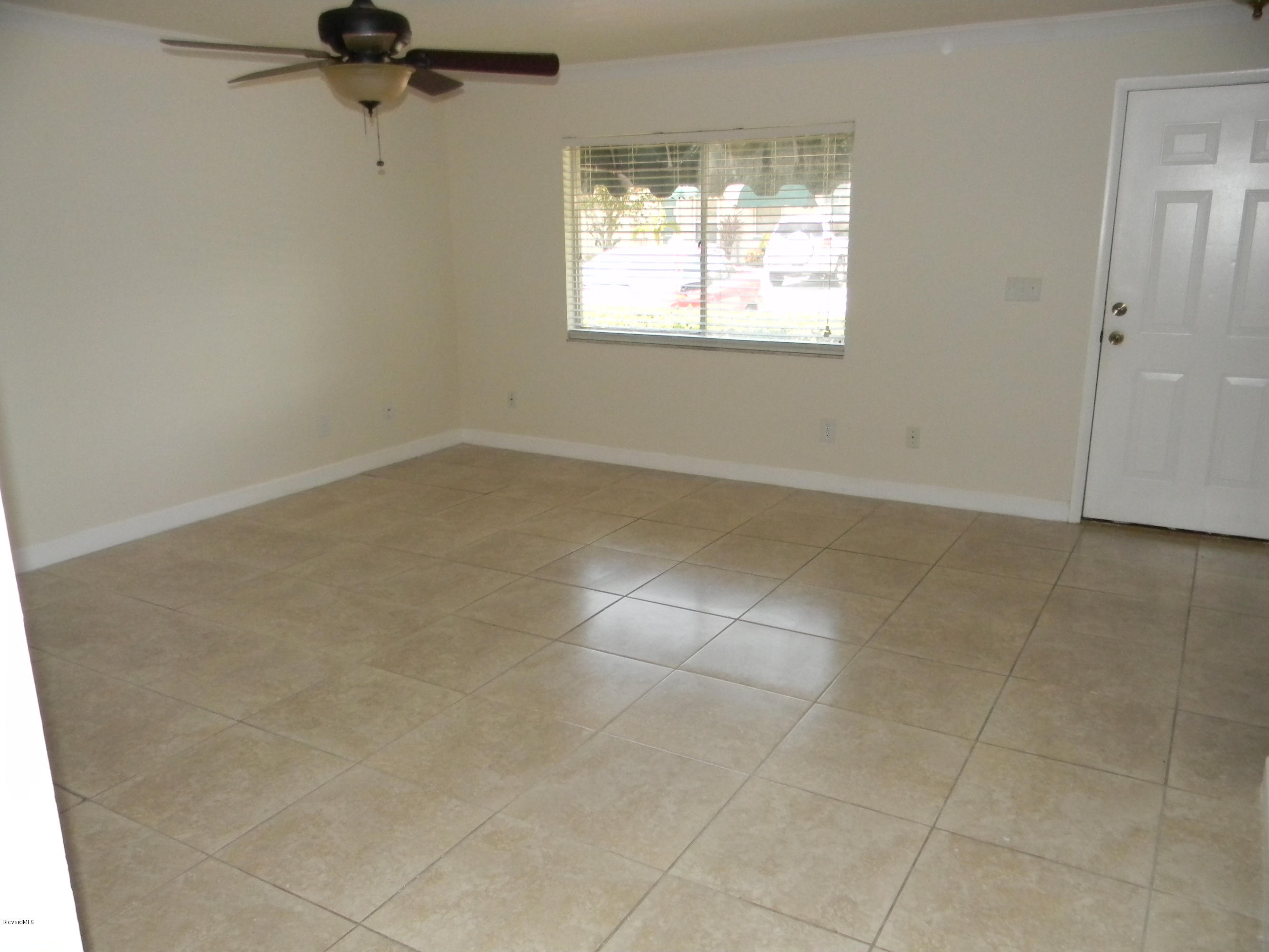 1880 Murrell Road, Unit 22 Rockledge, FL 32955 - Photo 2 of 19 Spacious family room