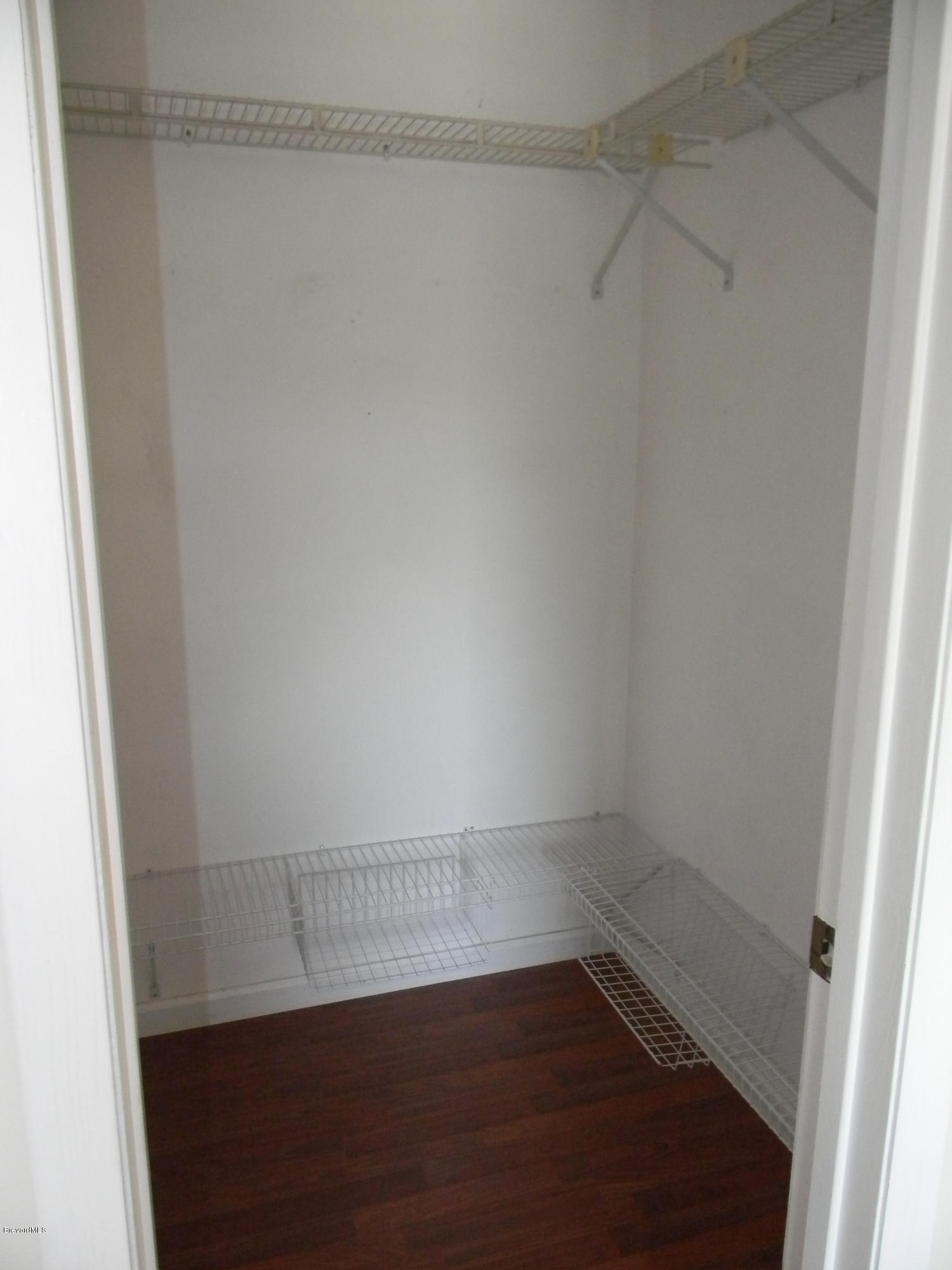 1880 Murrell Road, Unit 22 Rockledge, FL 32955 - Photo 12 of 19 Walk-in closet in master suite