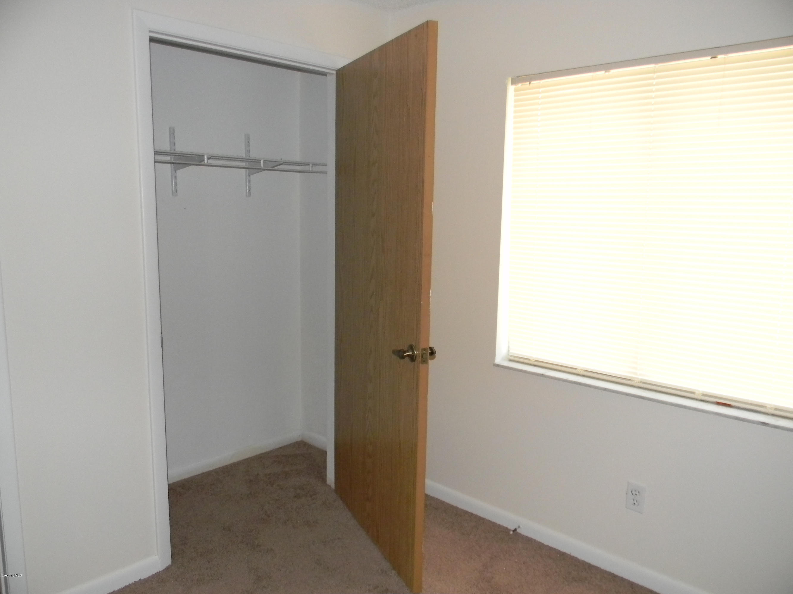 1880 Murrell Road, Unit 22 Rockledge, FL 32955 - Photo 17 of 19 Closet in second bedroom